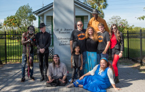 "Freakshow" Cast pose by monument honoring Al and Jeanie Tomaini, billed "the world's strangest couple." Al was a giant, and Jeanie, "the half girl." 